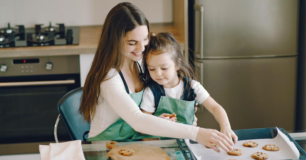 divorced mother with daughter happy to receive the 2021 child tax credit